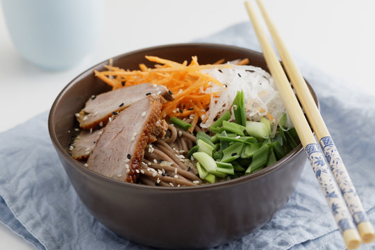 Duck breast with soba noodles and vegetables