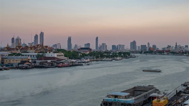4K Timelapse Sequence of Bangkok, Thailand - The Chao Phraya River from day to night