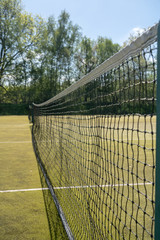 Fototapeta premium Detail of tennis net on court