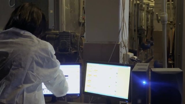 Farmer make report about factory and input data in computer