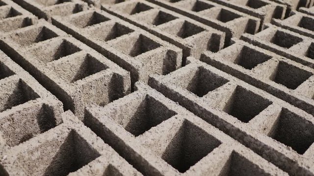 Brick forms. Production of bricks from volcanic ash in the Philippine city of Legazpi. Shooting in motion.
