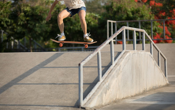 skateboarder skateboarding on skatepark ramp