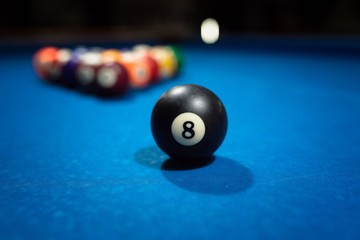 billiard table with black ball