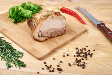 baked pork with salad and spices