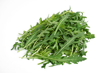 green fresh ruccola isolated on white background, close up studio shot