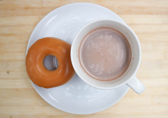 donut or doughnut with hot cocoa