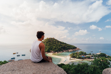 Happy A man Enjoying at viewpoint on island in thailand Travel Vacation
