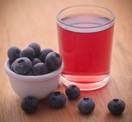 Group of fresh blueberries with juice