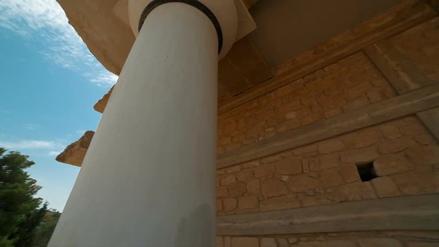 Ultra wide-angle rotating view of a spectacular temple in Knossos, Heraklion, Crete, Greece with Minoan frescoes on the wall