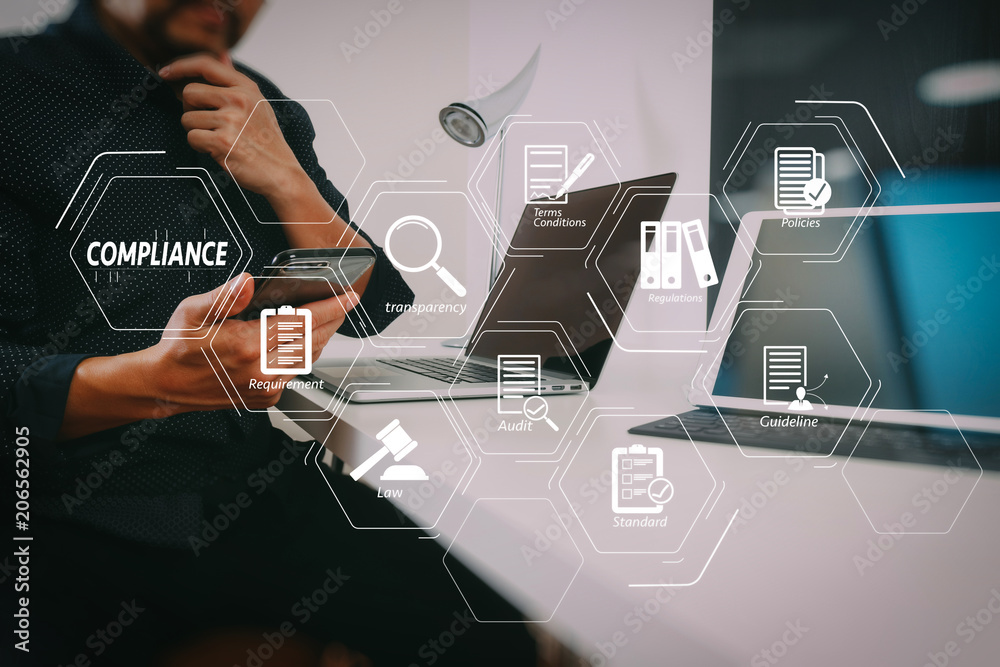 Poster businessman working with smart phone and digital tablet and laptop computer in modern office