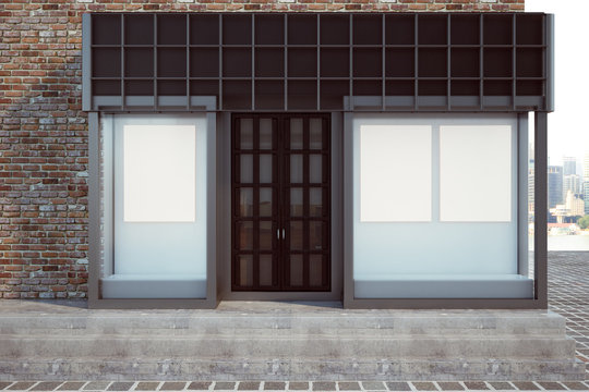 Modern storefront with blank poster