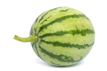 Young watermelon fruit on white background