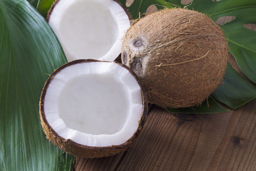 piece of coconut with wooden background
