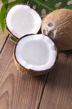 piece of coconut with wooden background