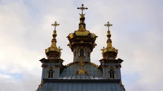 Golden domes with crosses on the Church