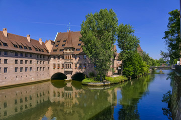Fototapeta na wymiar Heilig-Geist-Spital, Pegnitz River, Nuremberg, Middle Franconia, Franconia, Bavaria, Germany, Europe