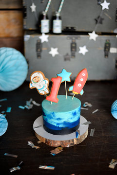 One year birthday party. Birthday in Space. Decorations for holiday party. Cake for holiday party. 