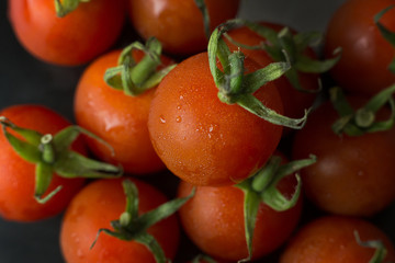 close up fresh tomato on black table  background.