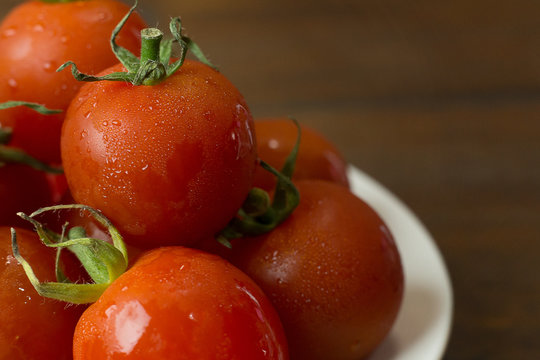 close up fresh tomato on wood table  background.