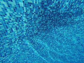 Underwater. Beautiful blue background of swimmingpool closeup