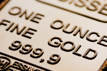 small  gold bar is one ounce. Pure gold.