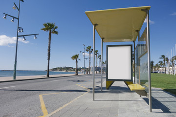 Bus stop with blank billboard