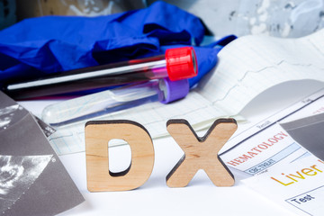 DX Acronym or abbreviation of medical diagnosis - process of determining type of disease on basis of complaints and symptoms. Letters DX stand near set of medical tests and tools: stethoscope, ECG