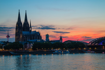 Fototapeta premium Cologne Cathedral at Sunset with ared sky