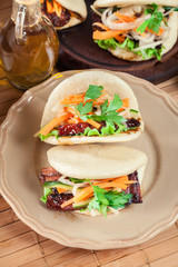 Gua bao, steamed buns with pork belly and vegetable