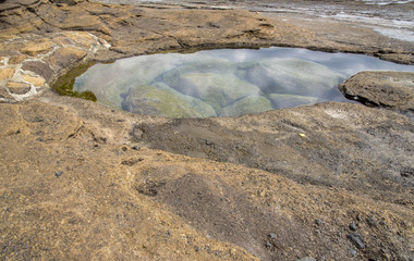 Natural rock pool at the coast, Jeju island, South Korea.