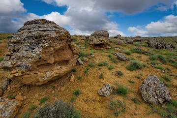 Shirkala. West Kazakhstan. In the boundless steppe around the famous mount Shirkala scattered huge picturesque stone balls-nodules.
