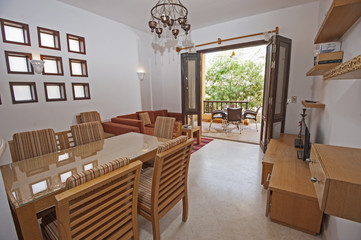 Interior design of luxury apartment living room with dining table
