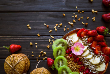 oatmeal, fruit, berries on the table