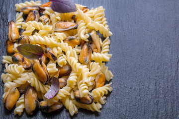 Italian pasta and mussels with copy space