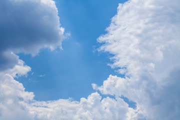 white clouds against blue sky background