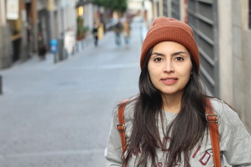 Fototapeta premium Trendy urban latin woman with copy space