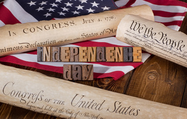 Independence Day banner with Historical Documents and the American flag