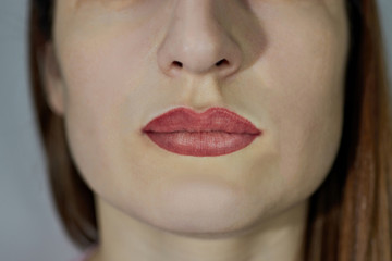 lips with fresh tattoo and pigment immediately after the procedure