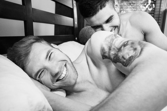 Naked, gay lovers, husbands in bed, tickling and laughing