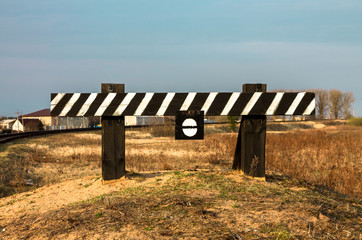 The end of the railway. Fencing. A sign of attention.