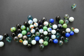 colored glass marble, 
hundreds of colorful glass marbles,

