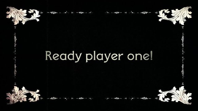 A re-created film frame from the silent movies era, showing intertitle text messages: Get Ready, Player One, Two, Go.
