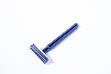 Blue shaving razor isolated in a white background