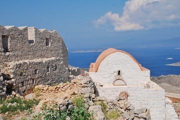 The renovated chapel in the ruins of the medieval Crusader Knights castle in the hills above Emborio on the Greek island of Halki.