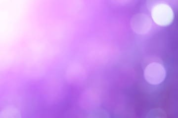Beautiful soft blur defocused and colorful ultra violet or purple Bokeh lights in nature blur background.