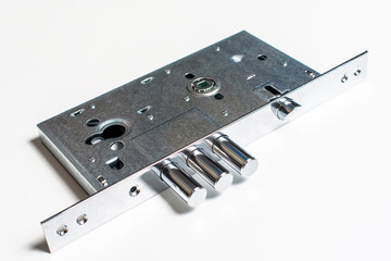 Mechanical lock with a key against white background