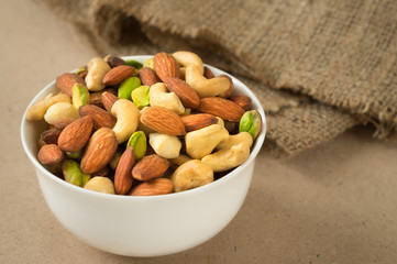 Mixed nut in white bowl