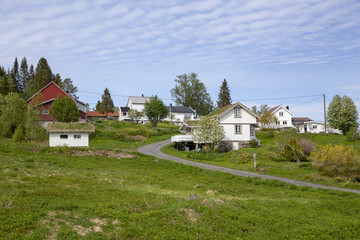 Old white country house in Bronnoy county Northern Norway