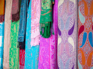 Fototapeta na wymiar Colorful scarves in street bazaars around anatolian cities in Turkey.