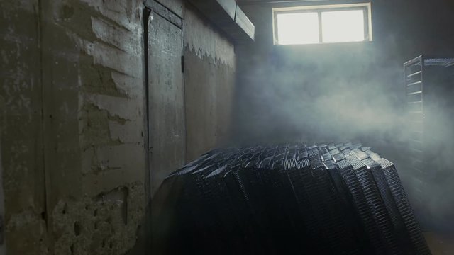 Dark basement with a small window